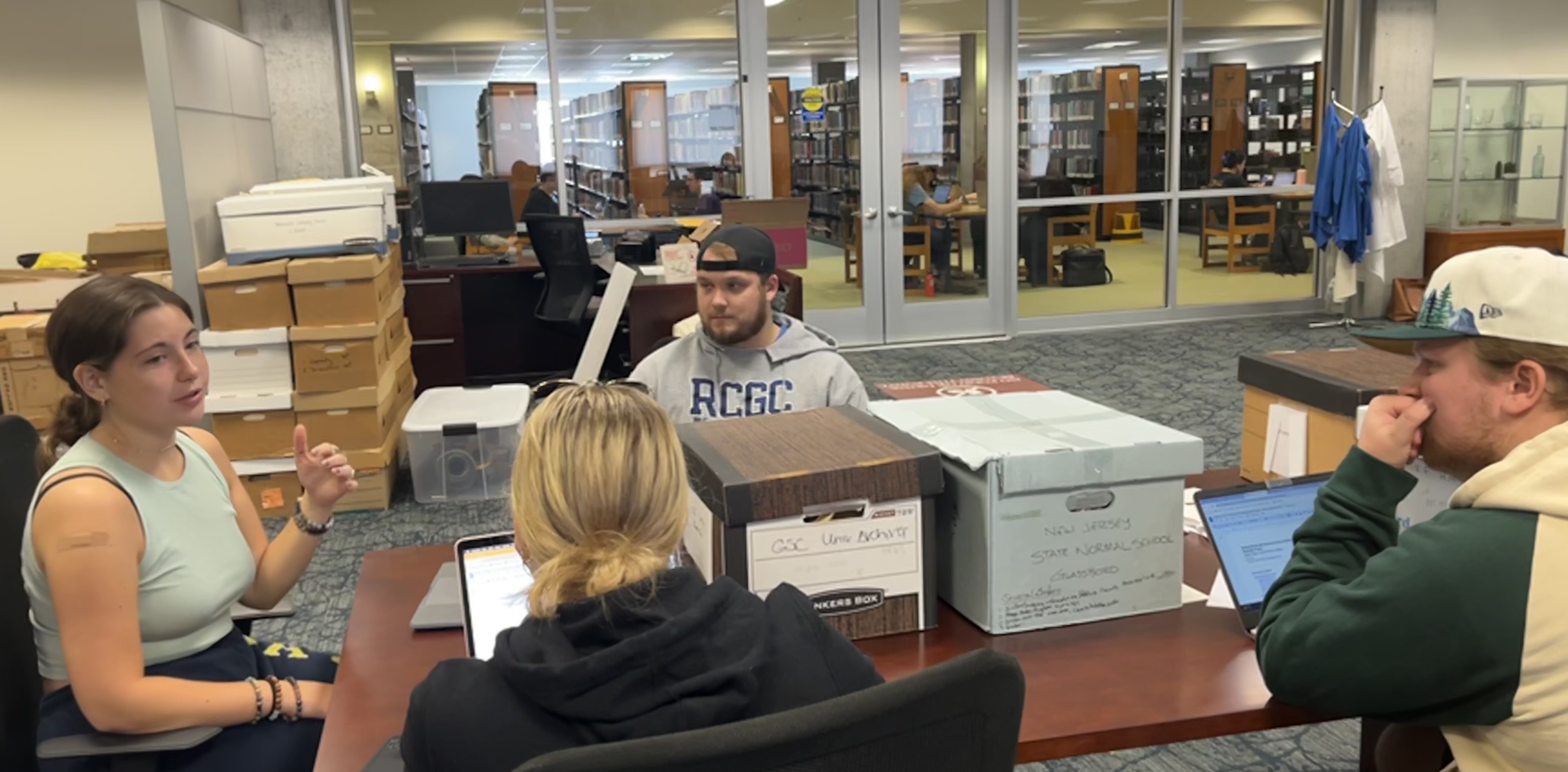 Students conducting research in the University Archives