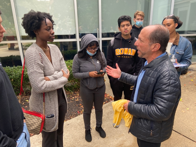 Ronald Ladell speaking with Rowan Students