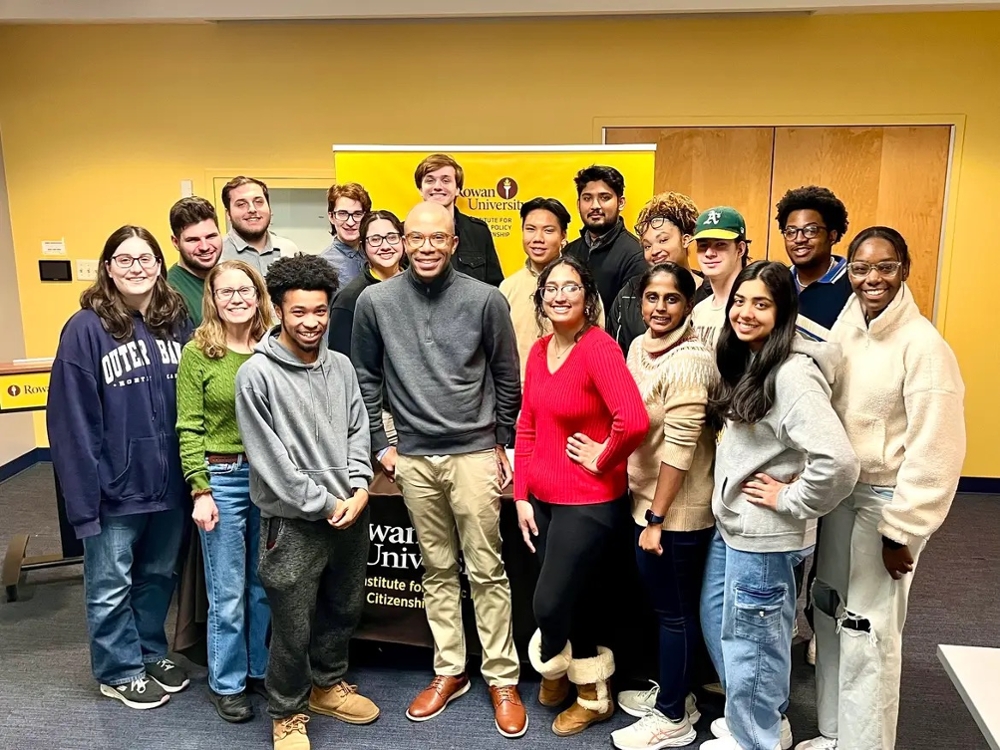 A group photos of RIPPAC students with Hon. Adam Taliaferro